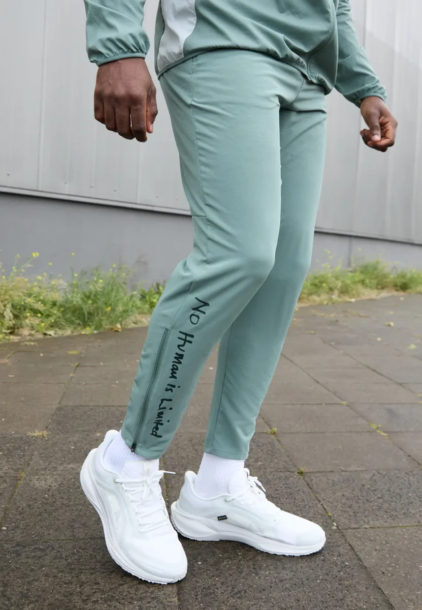 STRIDE PANT EK - Jogginghose - clay green/seaweed