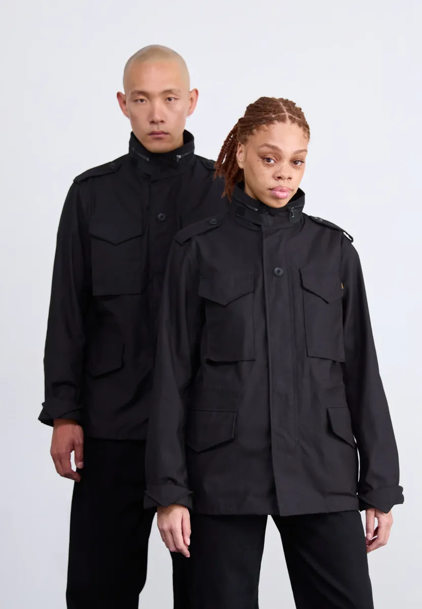 STUDIO UNISEX - Übergangsjacke - black