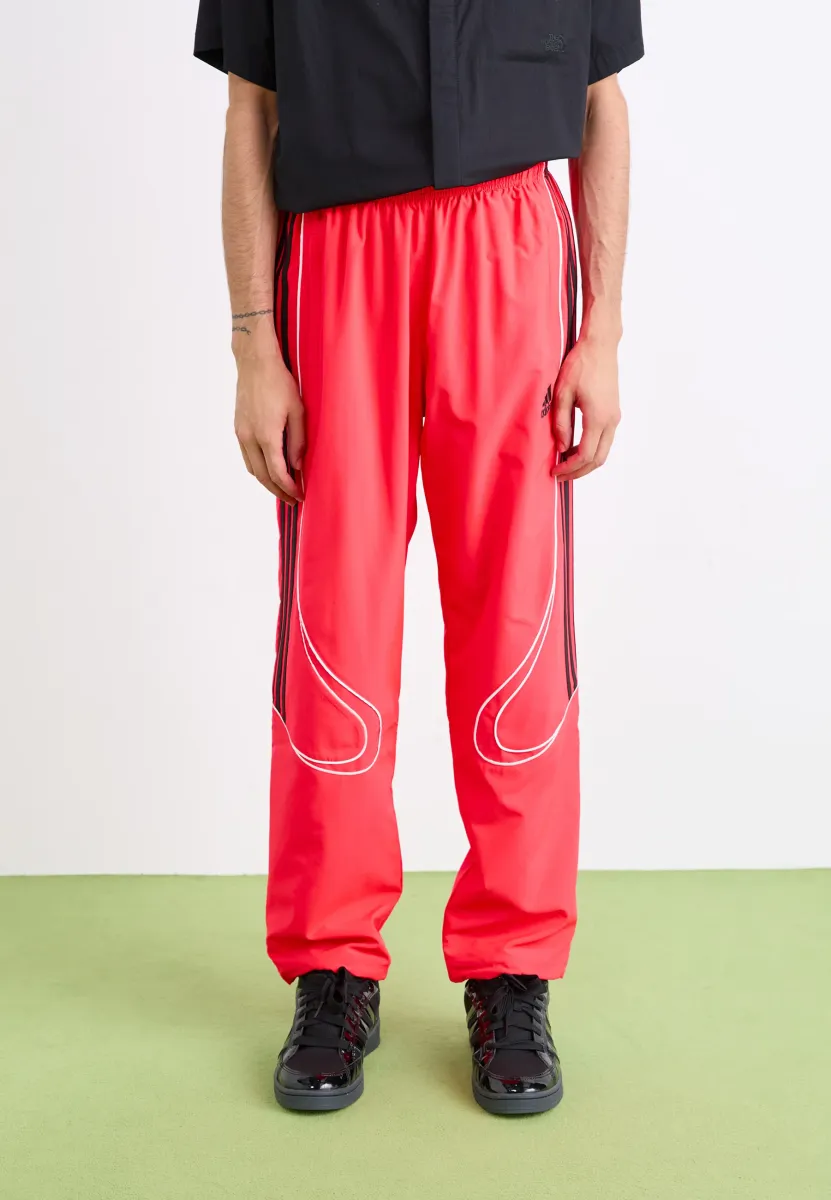 TEAMGEIST  - Jogginghose - lucid red/black