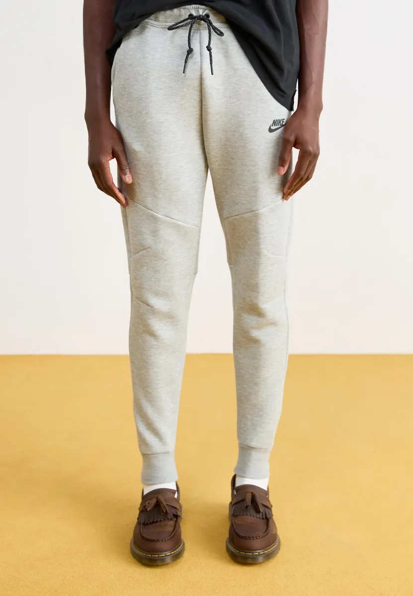 TECH FLEECE - Jogginghose - dark grey heather/black