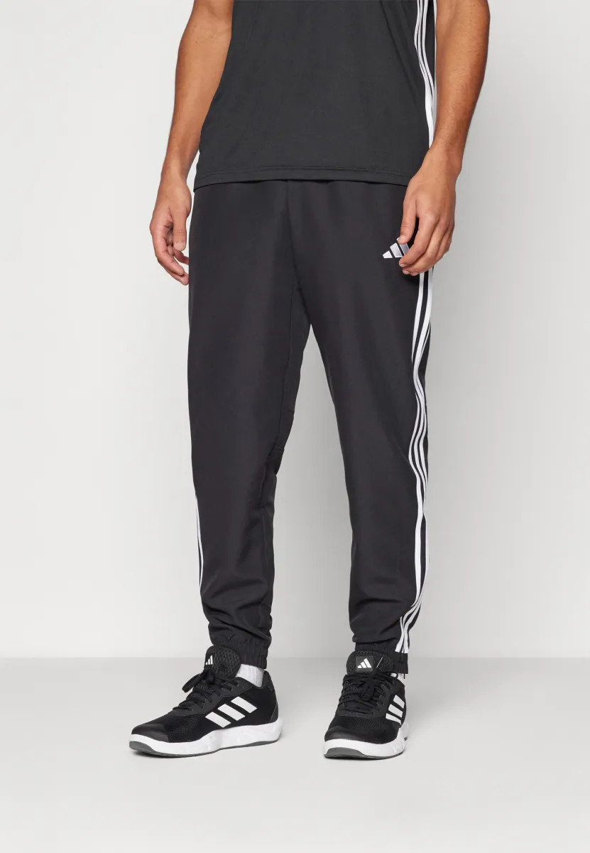 TIRO25 ESSENTIALS WOVEN - Jogginghose - black/white