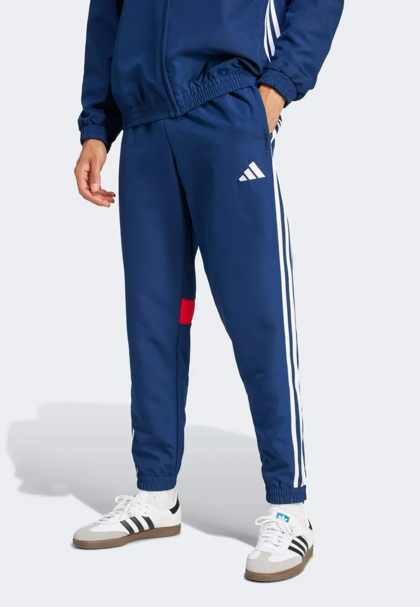 TIRO25 ESSENTIALS WOVEN - Jogginghose - team navy red