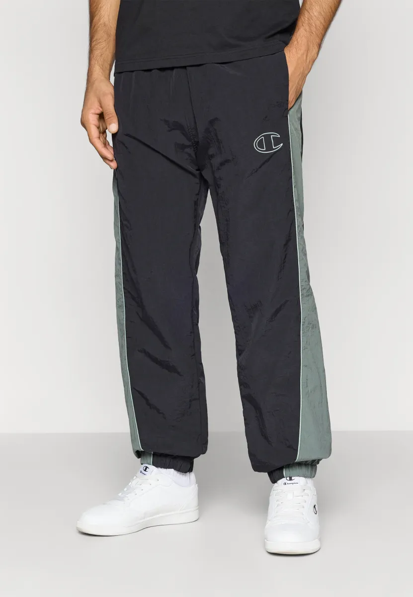 TRACK PANTS - Jogginghose - green/black