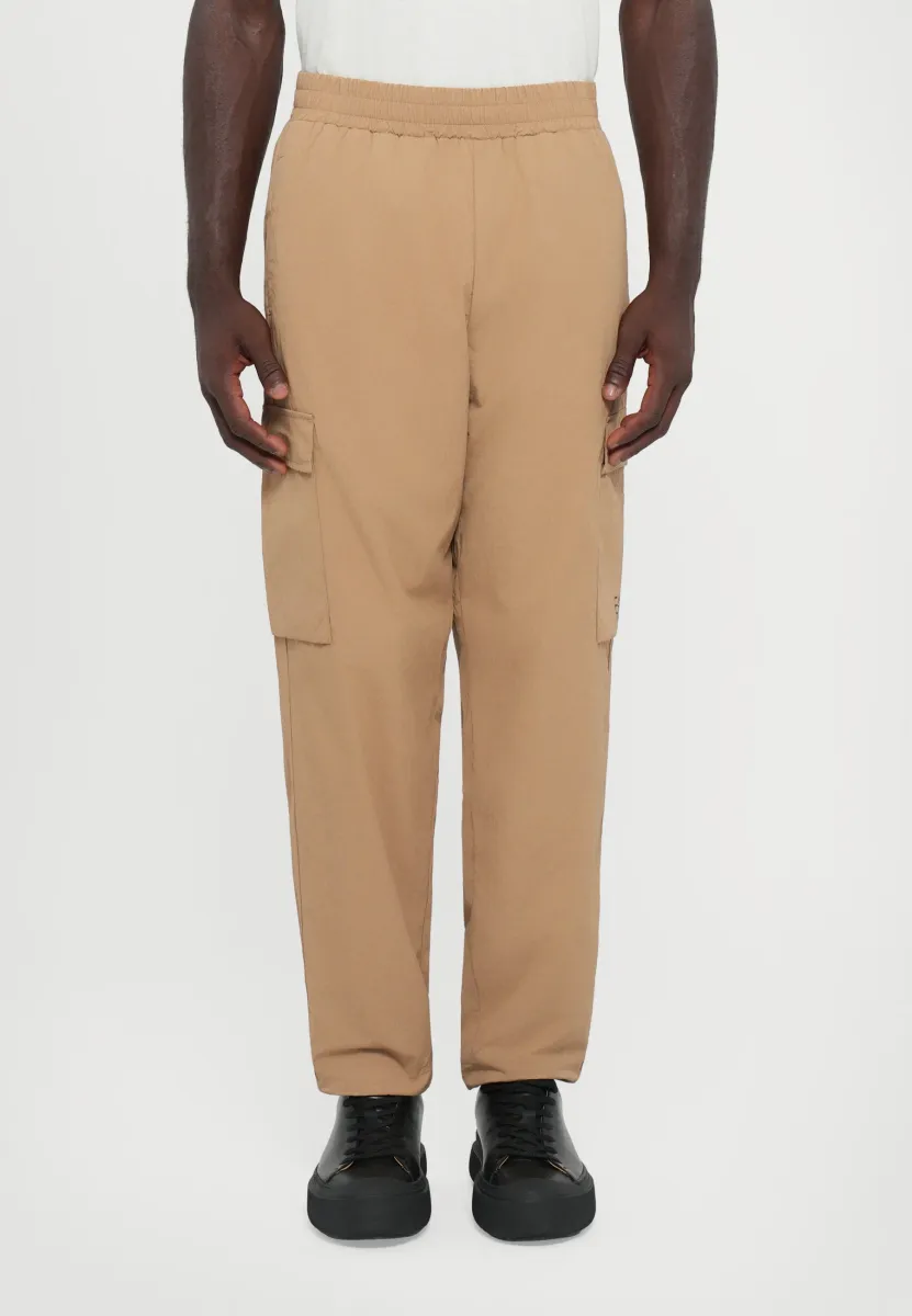 TRAIN CORE PANTS - Cargohose - tigers eye