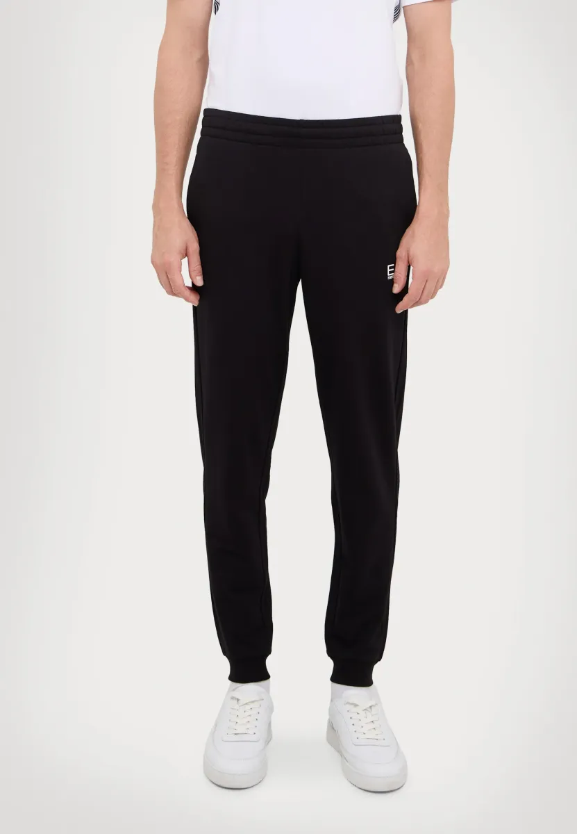 TRAIN CORE PANTS - Jogginghose - black
