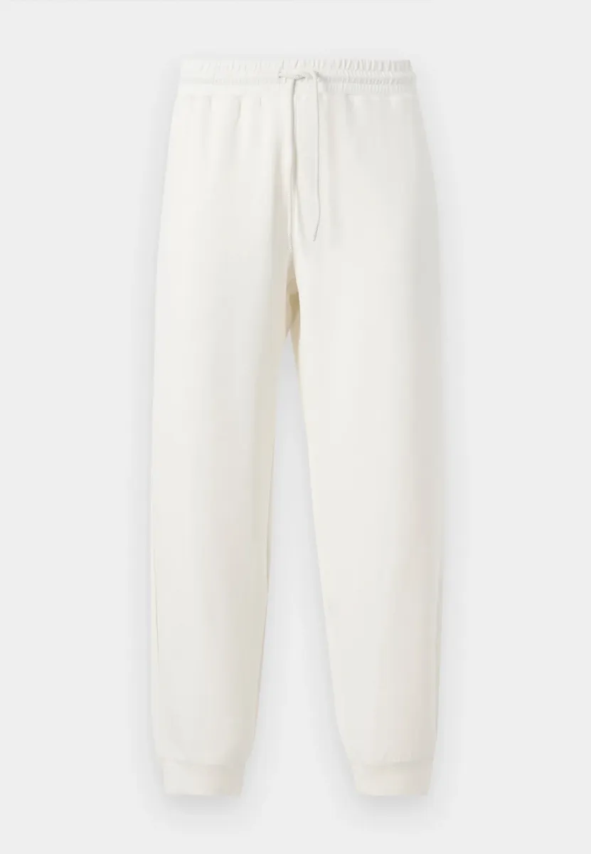 TRAIN CORE PANTS UNISEX - Jogginghose - vanilla ice