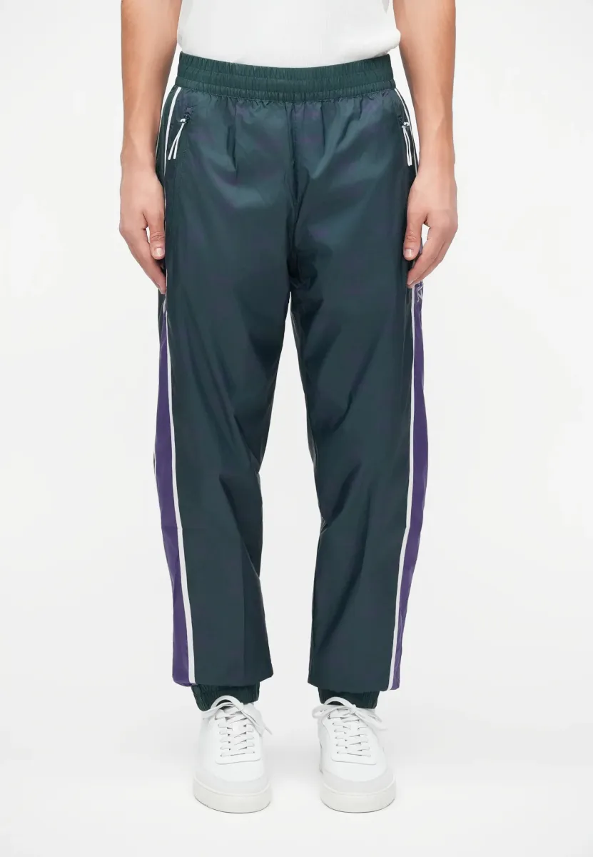 TRAIN GRAPHIC SERIES PANTS MONOGRAM - Jogginghose - dark green fancy