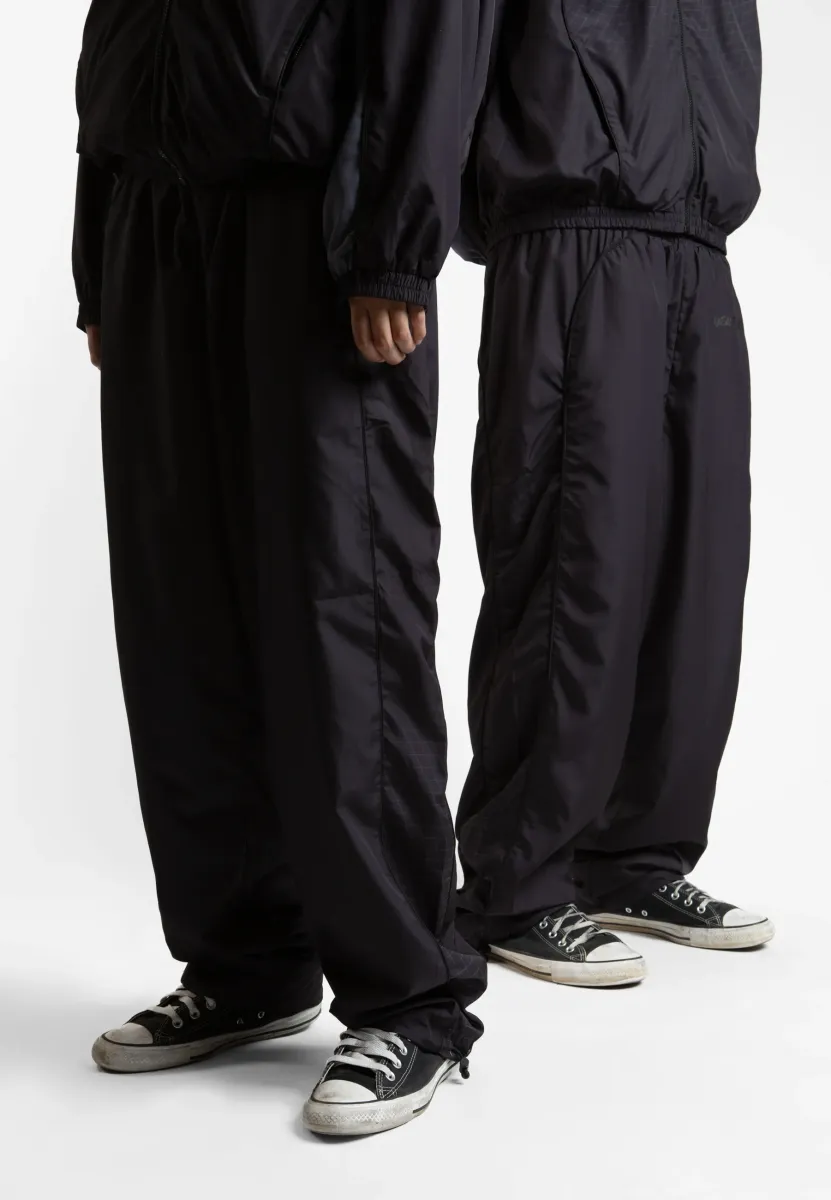 UNISEX SPINE TRACK - Jogginghose - black