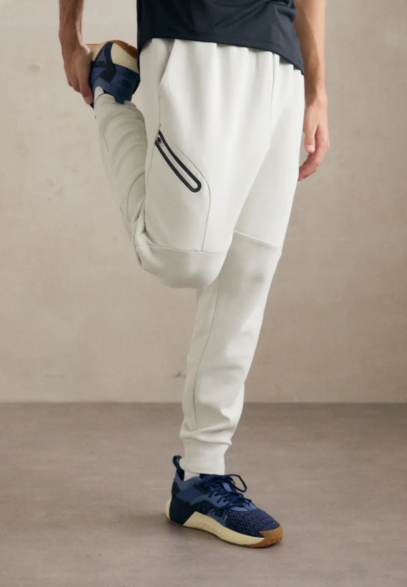 UNSTOPPABLE FLEECE - Jogginghose - summit white/black