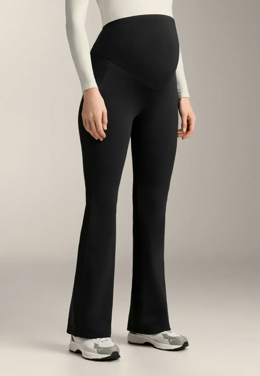 WARM FLARE MATERNITY - Stoffhose - black