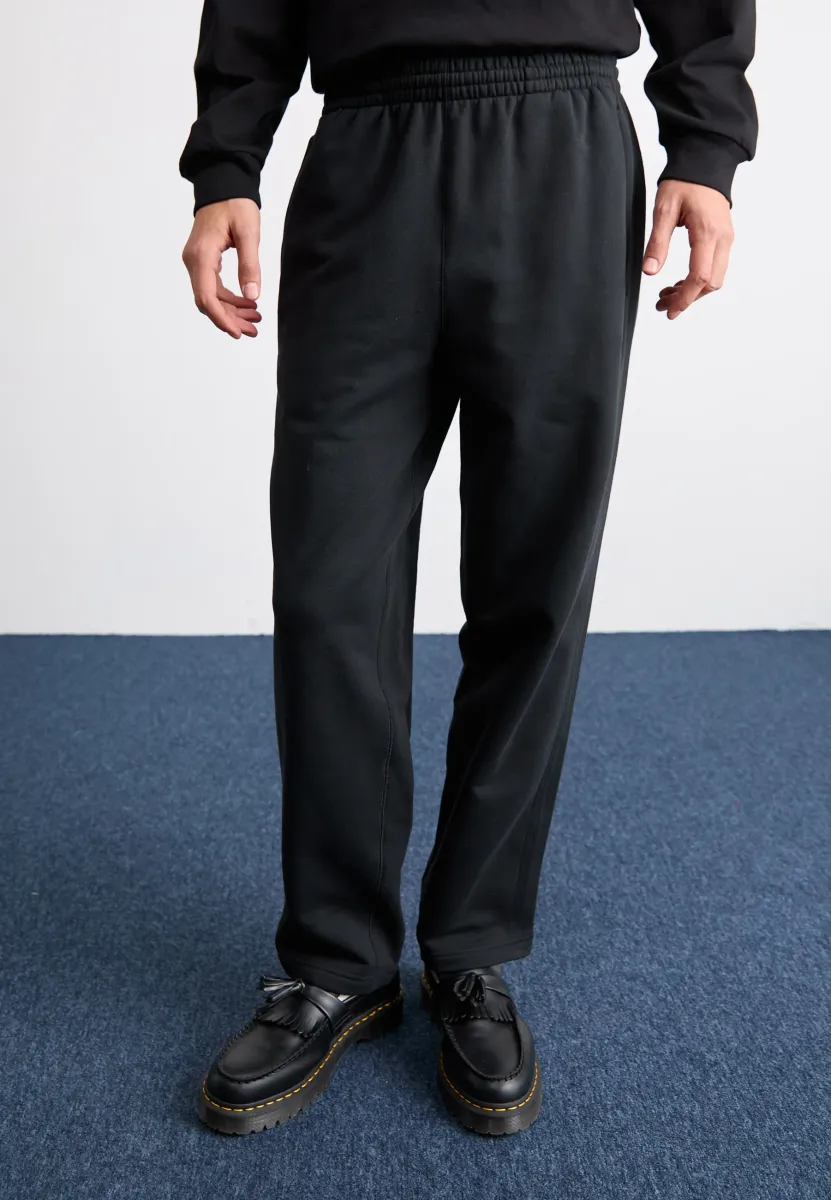 WIDE - Jogginghose - black
