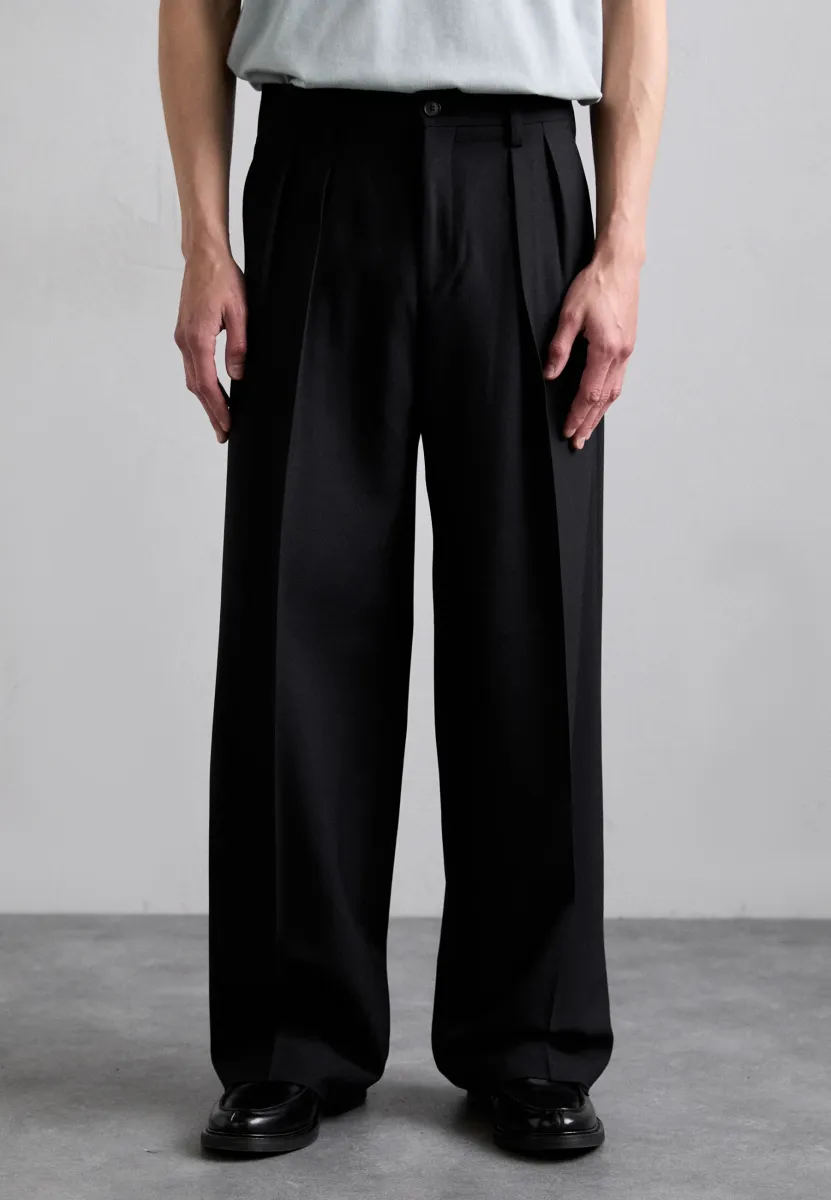 WIDE TROUSERS - Stoffhose - black