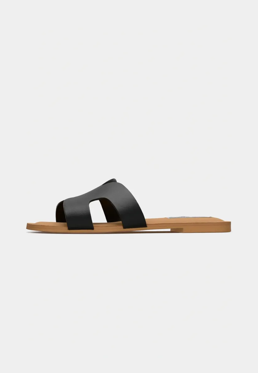 ZARNIA - Pantolette flach - black