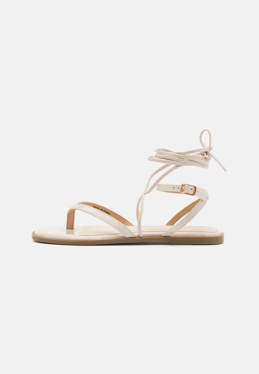 Zehentrenner - off-white